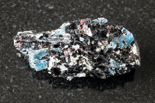 unpolished Biotite with Kyanite crystals on black - Stock Photo - Images