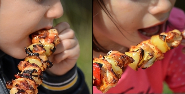 Children Eating Skewers 1 - 2 Videos