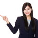 Young businesswoman with finger point upwards - PhotoDune Item for Sale