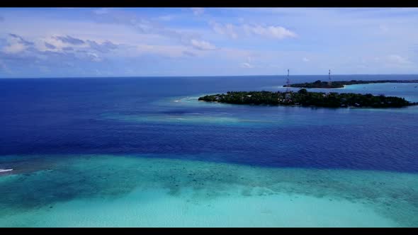 Aerial drone view travel of marine coastline beach voyage by shallow ocean and white sandy backgroun alt