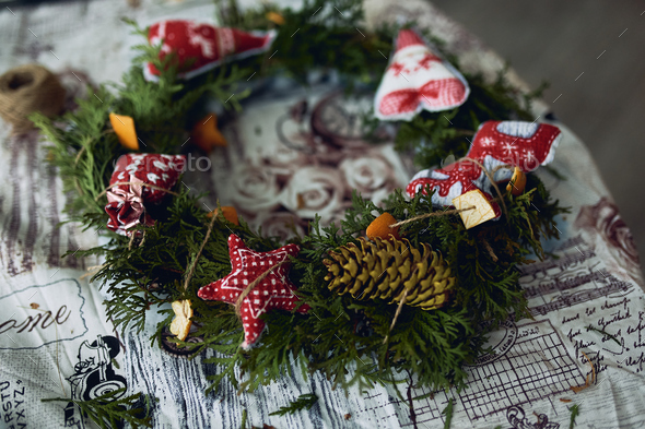 Handmade Christmas wreath. Making Christmas decorations.