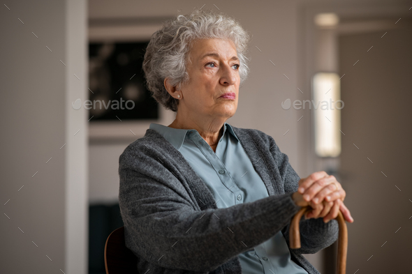 Lonely old woman at home