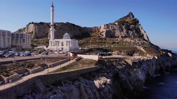 Engineer Promenade And Ibrahim-al-Ibrahim Mosque On The Rugged Cliffs Of Europa Point In Gibraltar. alt