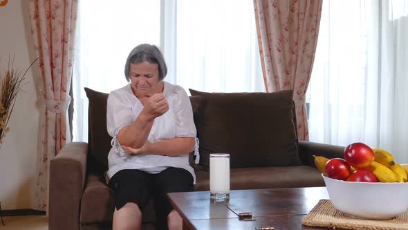 Senior Woman Suffering from Elbow Pain