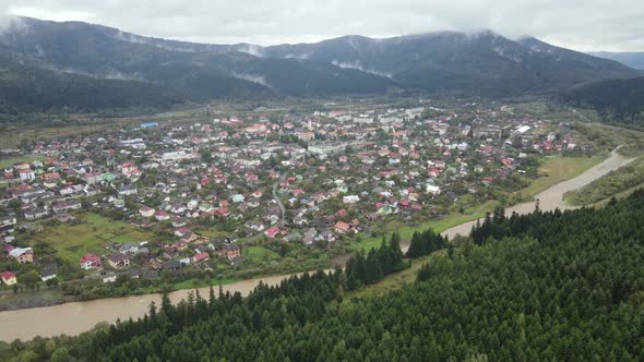 Aerial View of the Village in the Carpathian Mountains in Autumn alt
