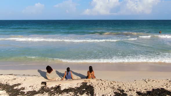 Three Women Relaxing in Tulum Beach Rivera Maya Aerial