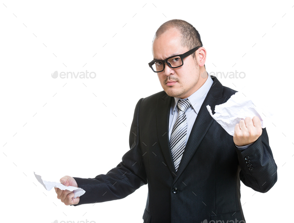 Businessman tear contract paper