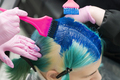 Hairdressers Using Brush While Applying Blue Paint to Female Emerald Hair Color. Process Dyeing Hair - PhotoDune Item for Sale
