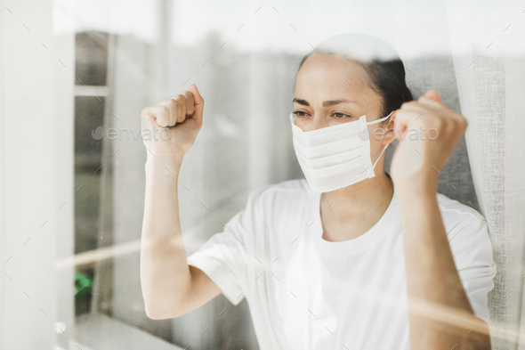 Angry patient in hospital coronavirus quarantine self isolation want to go outside.