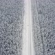 Aerial Top View From Drone Birds Eye View of Winter Landscape and Snowy Ice Road Car Moving on Area - VideoHive Item for Sale