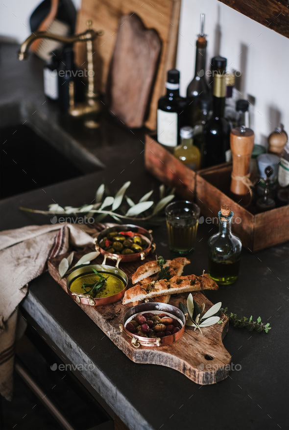 Traditional Mediterranean meze appetizers platter over kitchen counter - Stock Photo - Images