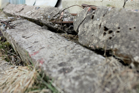 Old Iron-concrete piles lie on the ground