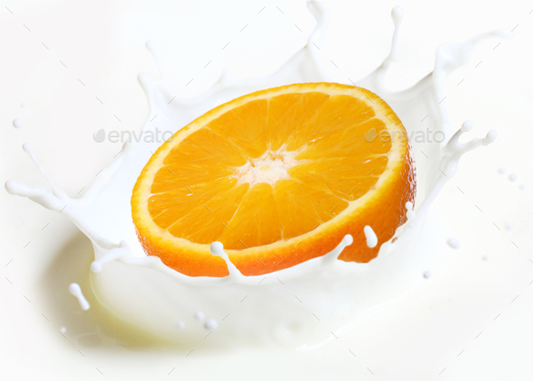 Orange Falls Into Splash Of Milk Stock Photo By Microstock Growth 