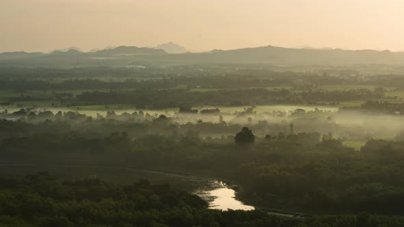 Beautiful landscape in the morning mist from the viewpoint. alt