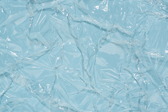 Blue Wrinkled Cling Film Texture, Wet Effect Abstract Vinyl Background.