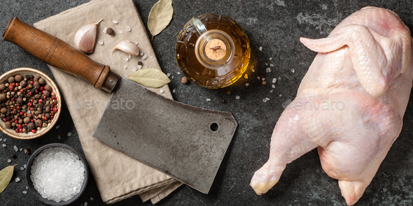 Fresh raw chicken on cutting board and spices for cooking Stock Photo by  ff-photo