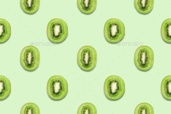 Kiwi Slices Seamless Pattern on Green Background. Stock Photo by ...