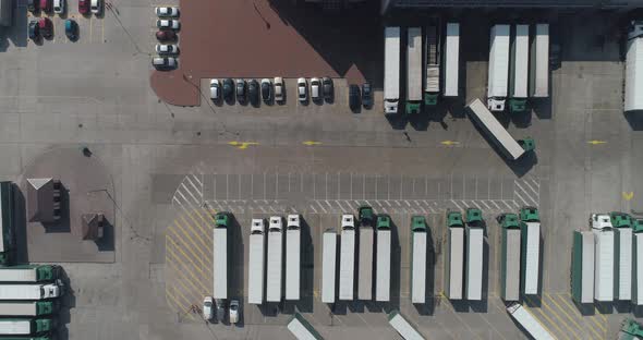 Buildings of Logistics Center, Warehouses Near the Highway, View From Height, a Large Number of alt