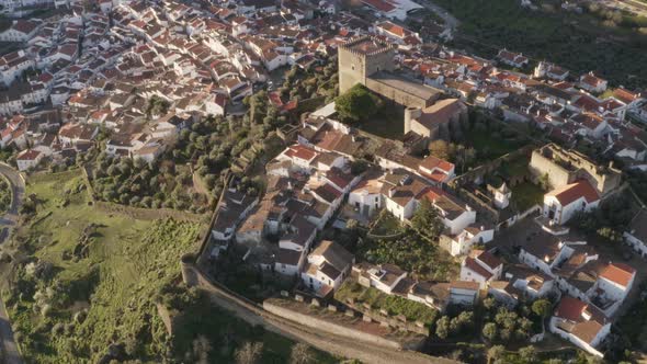 Aerial drone view of Castelo de Vide in Alentejo, Portugal and Serra de Sao Mamede mountains on the alt