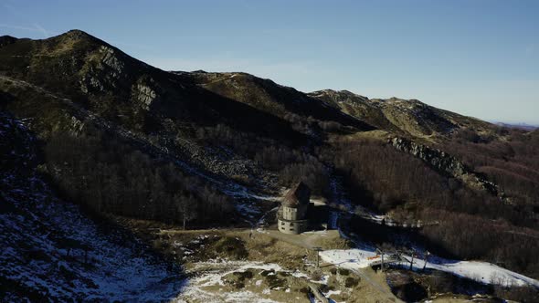 Aerial, Alps Mountains Partially Covered With Snow In Italy