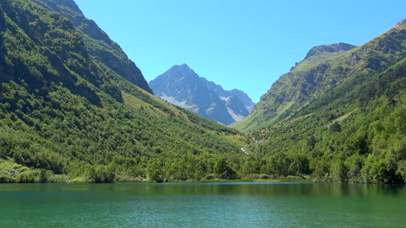 View lake scenes in mountains, national park Dombai, Caucasus