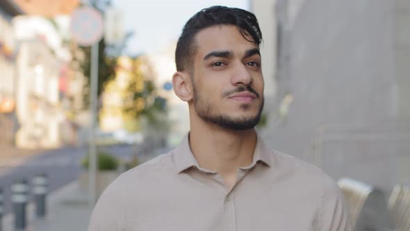 Headshot Arab Bearded Man Walks in City alt