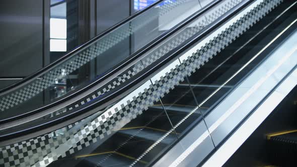 Escalator in airport, train station, subway underground or modern business center alt