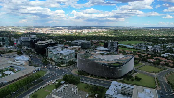 afternoon traffic on cloudy day in Sandton city in Johannesburg financial centre, aerial alt