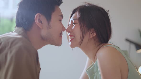 Asian marry Couple in love sharing genuine emotions and happiness alt