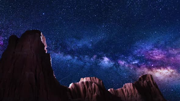 Space Star Trails Over Sandstone Canyon Walls alt