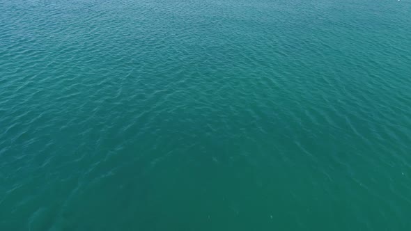 4k drone video flight over ocean, sea. Close to the water alt