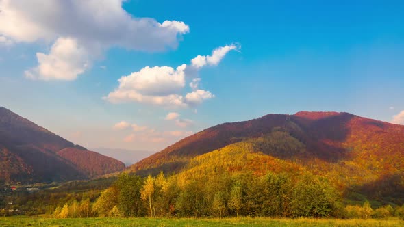 Autumn Mountain Landscape with a Fast Clouds and Shadows alt