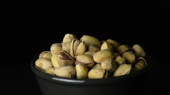 Pistachios Dried Fruit Gyrating in a Bowl alt