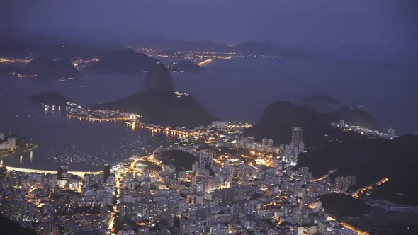 night panning shot from botafogo, sugarloaf mountain to copacabana beach in rio alt