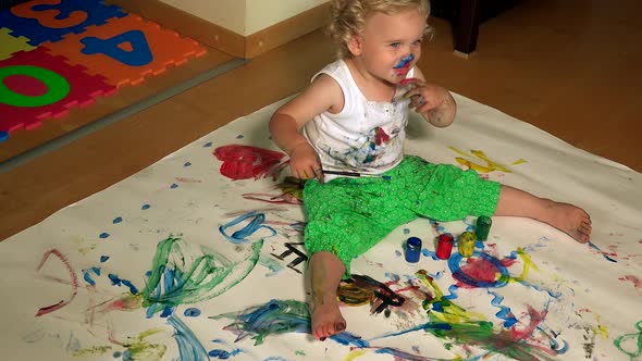 Child Paint with Color Finger on Face