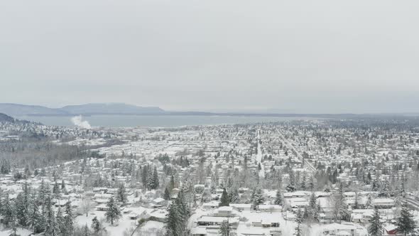Aerial Above Snow Covered Town Along The Ocean Waterfront   Bellingham Washington Usa alt