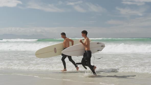 Father and young adult son enjoying outdoor activities together alt