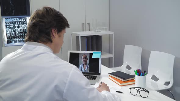 Distant Meeting Two Doctors alt