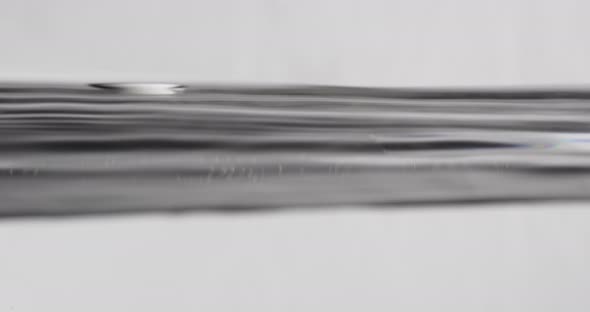 Water Surface In Motion Making Abstract Shapes alt