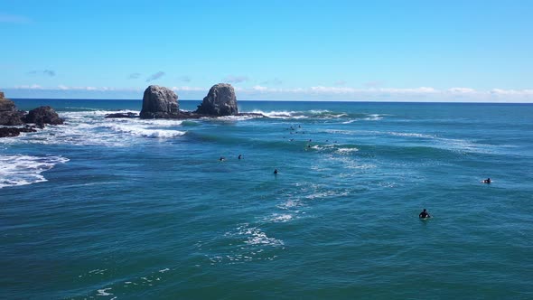 surfing in punta de lobos chile sunny day incredible landscape recorded with drone alt