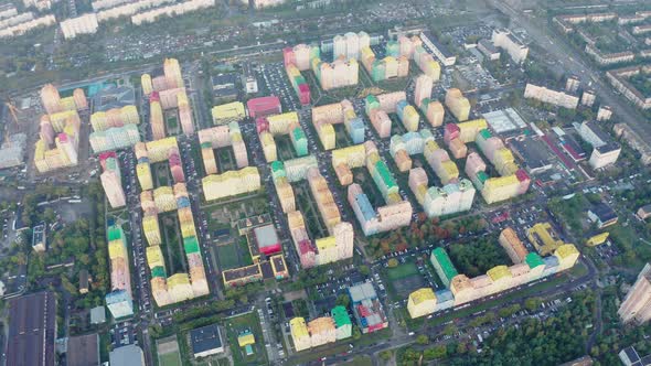 Top view of the colorful modern buildings, aerial footage from the drone alt