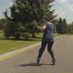 Skillful Female Rollerblading Backwards Outdoors - VideoHive Item for Sale