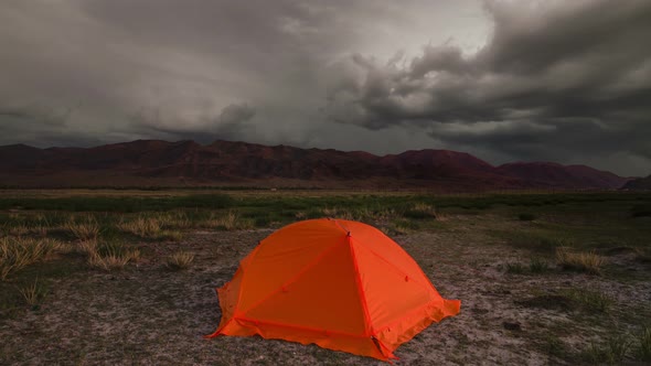 Tourist Tent on the Background of a Stormy Sky alt