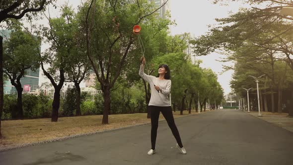 Taiwanese Woman Playing With A Chinese YoYo By Forrestbro VideoHive