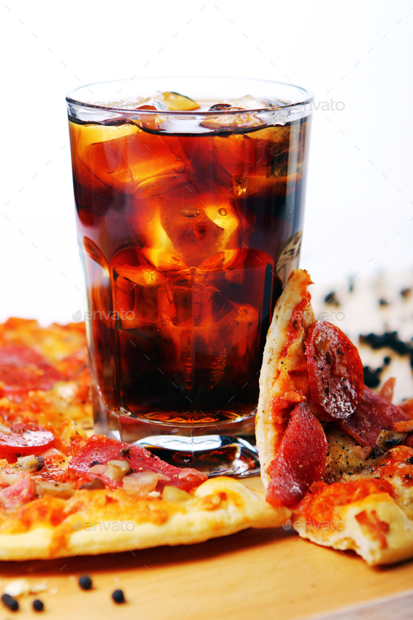 Fresh pizza and cold cola drink