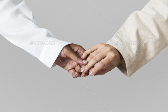Hands of diversity coming together in unity