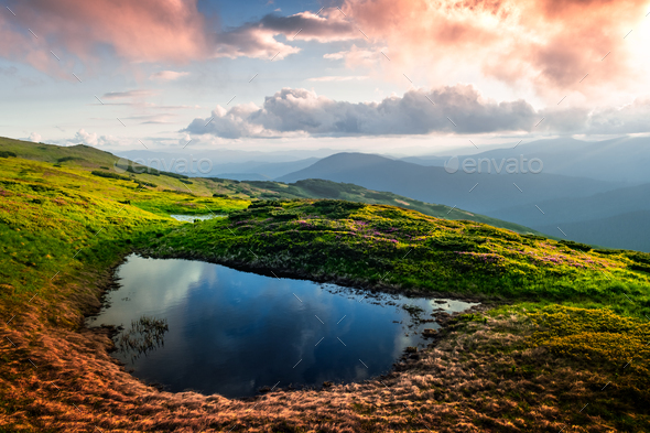 Mountain lake on sunrise time - Stock Photo - Images
