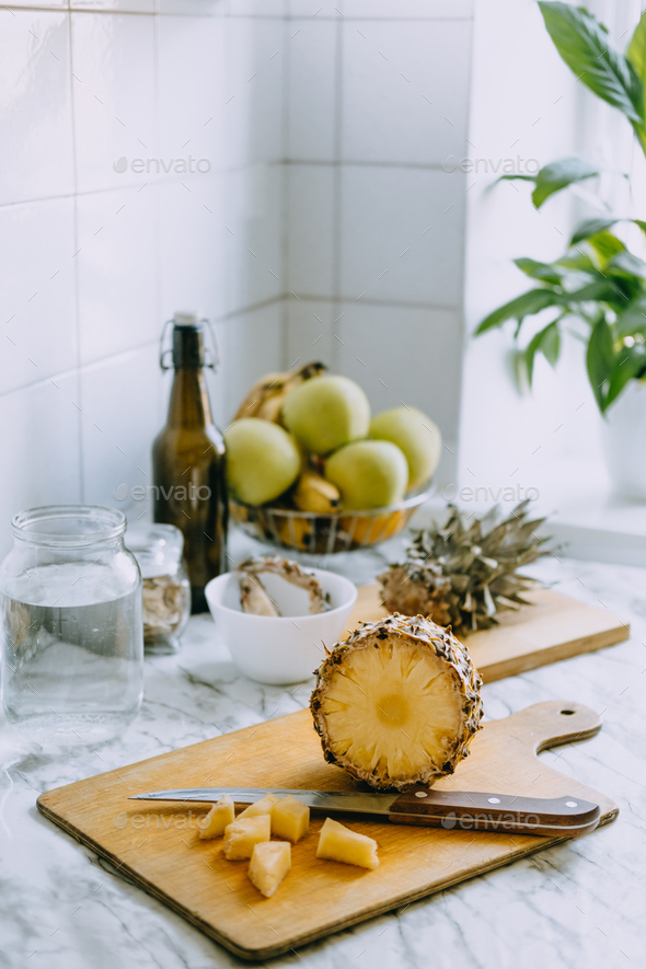 Fermented pineapple kombucha drink tepache. Cooking process of homemade probiotic superfood - Stock Photo - Images
