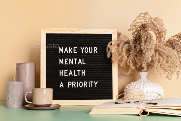 Make your mental health a priority motivational quote on the letter board