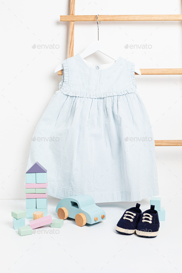 Download Cute Baby Clothes Hanging On The Rack Stock Photo By Oksaly Photodune